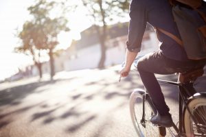 Young man riding a bicycle