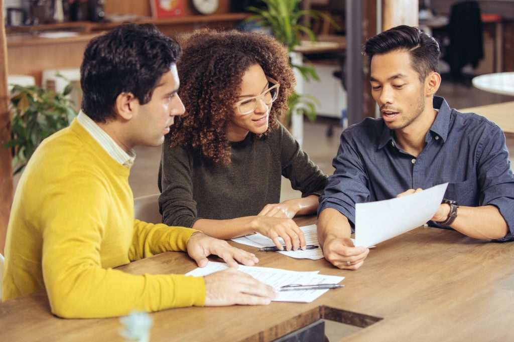 Couple on meeting with real estate advisor